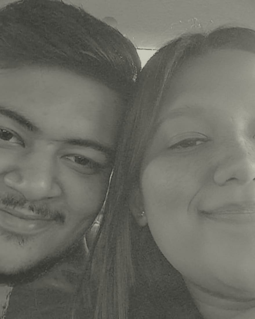 Rachel and Praduan cheek to cheek, sunlit